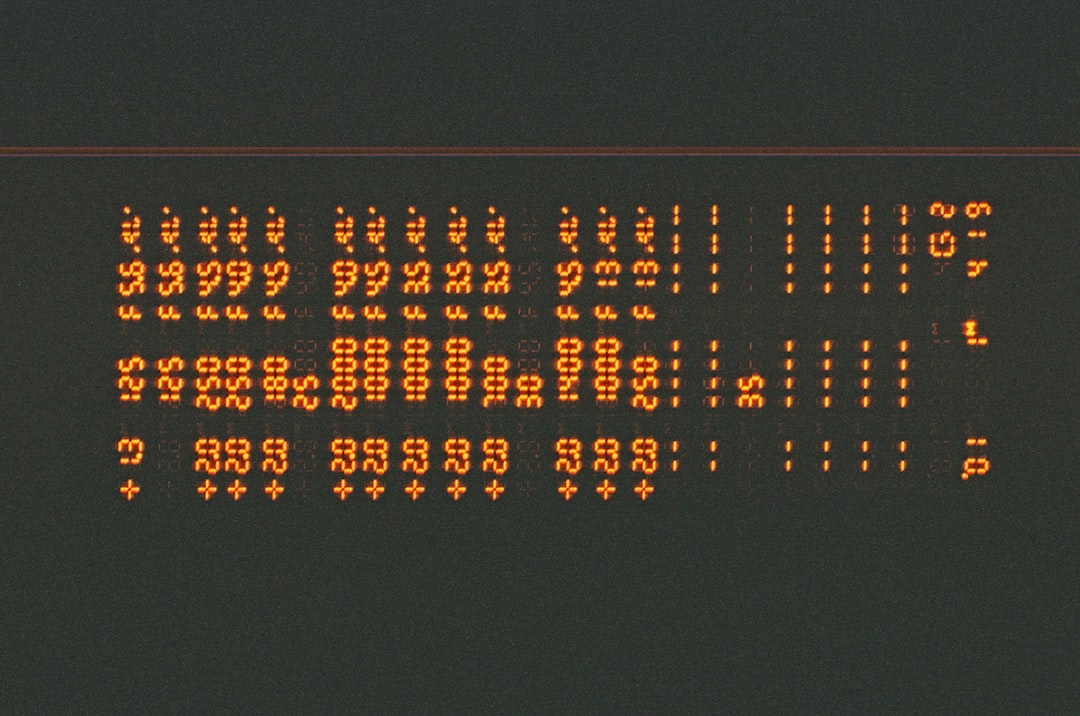 database code on screen - a close up of a sign with numbers on it